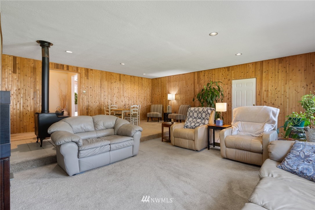 128 183rd Street Southwest Bothell, WA 98012 - Photo 23 of 33 a living room with furniture and a large window