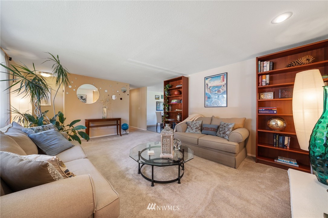 128 183rd Street Southwest Bothell, WA 98012 - Photo 5 of 33 a living room with furniture and a large window