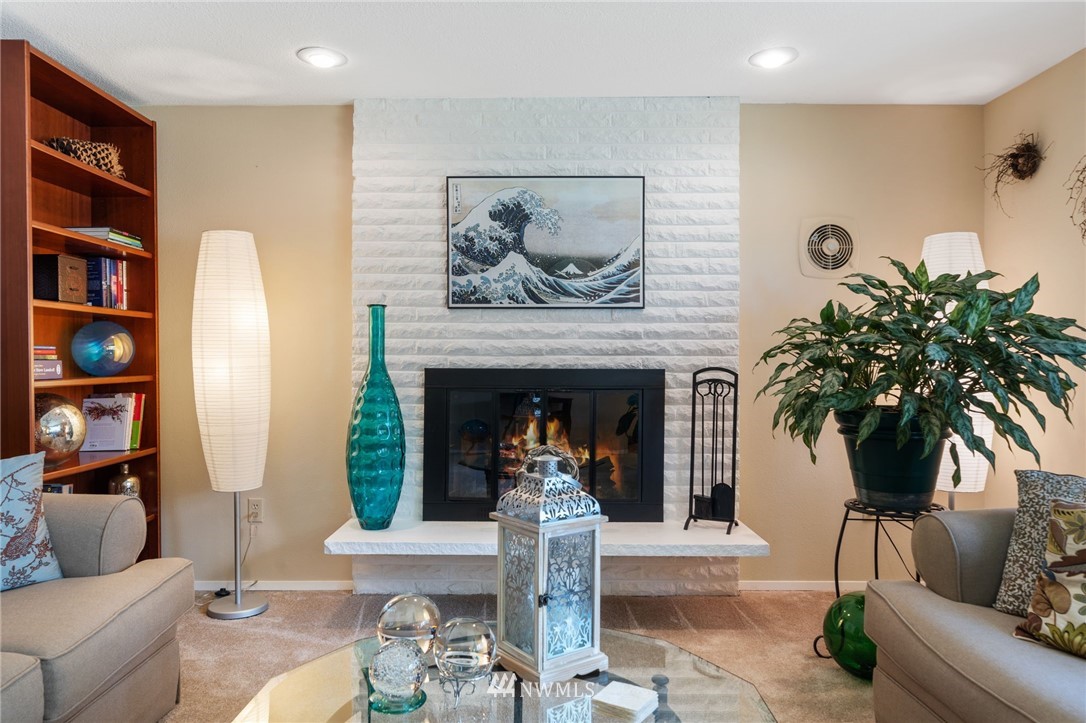 128 183rd Street Southwest Bothell, WA 98012 - Photo 6 of 33 a living room with furniture and a fireplace