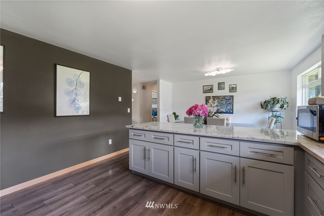 128 183rd Street Southwest Bothell, WA 98012 - Photo 10 of 33 a spacious bathroom with a double vanity sink and a mirror