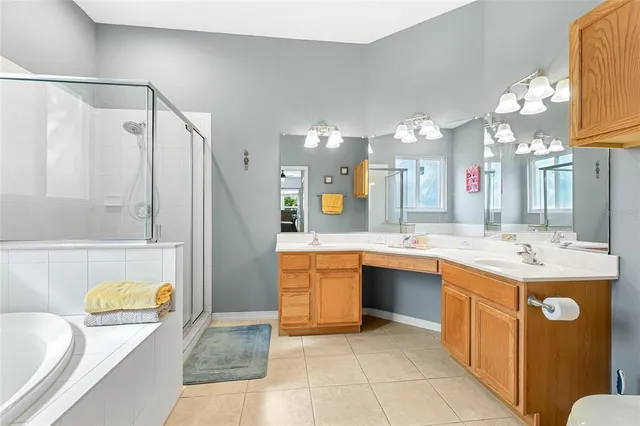 a large kitchen with a lot of counter space and a sink