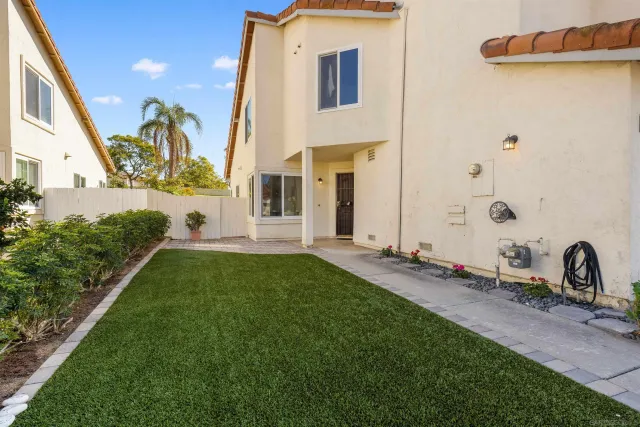 a view of a back yard of the house