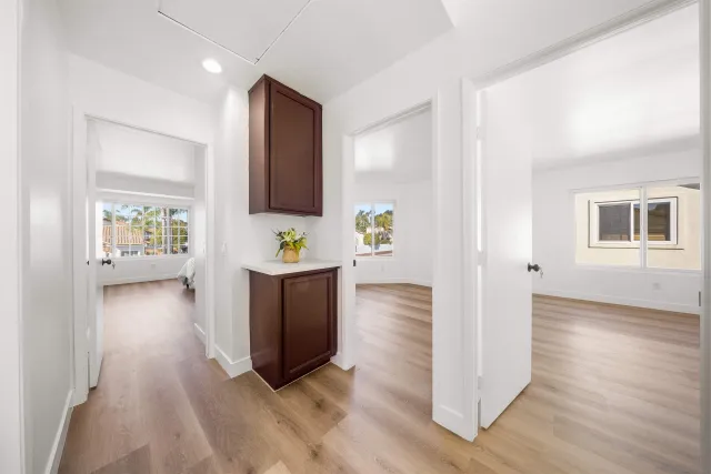 a view of entryway with wooden floor