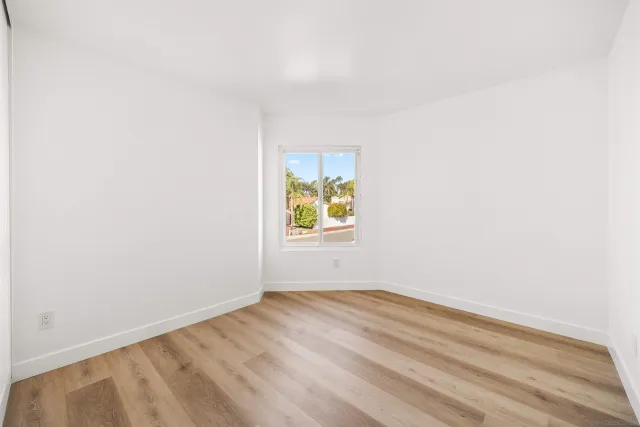 a view of a house with backyard and porch