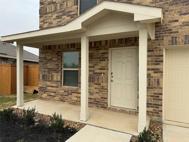 a front view of a house with a outdoor space