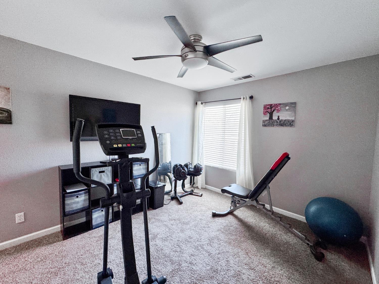 2457 Carson Avenue Clovis, CA 93611 - Photo 17 of 33 a view of a workspace with furniture