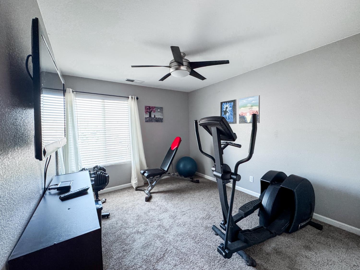 2457 Carson Avenue Clovis, CA 93611 - Photo 18 of 33 a view of a room with gym equipment
