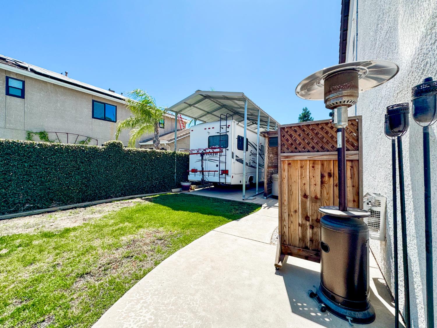 2457 Carson Avenue Clovis, CA 93611 - Photo 28 of 33 a front view of a house with garden