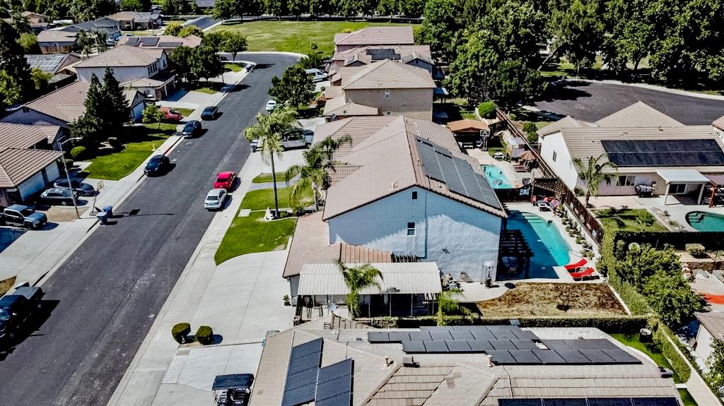 2457 Carson Avenue Clovis, CA 93611 - Photo 31 of 33 an aerial view of multiple houses with yard