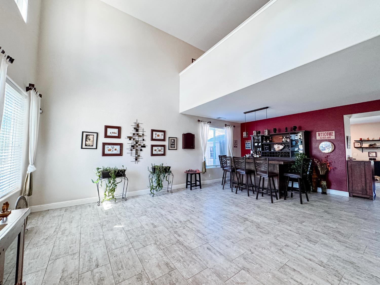 2457 Carson Avenue Clovis, CA 93611 - Photo 4 of 33 a view of a dining room with furniture and chandelier