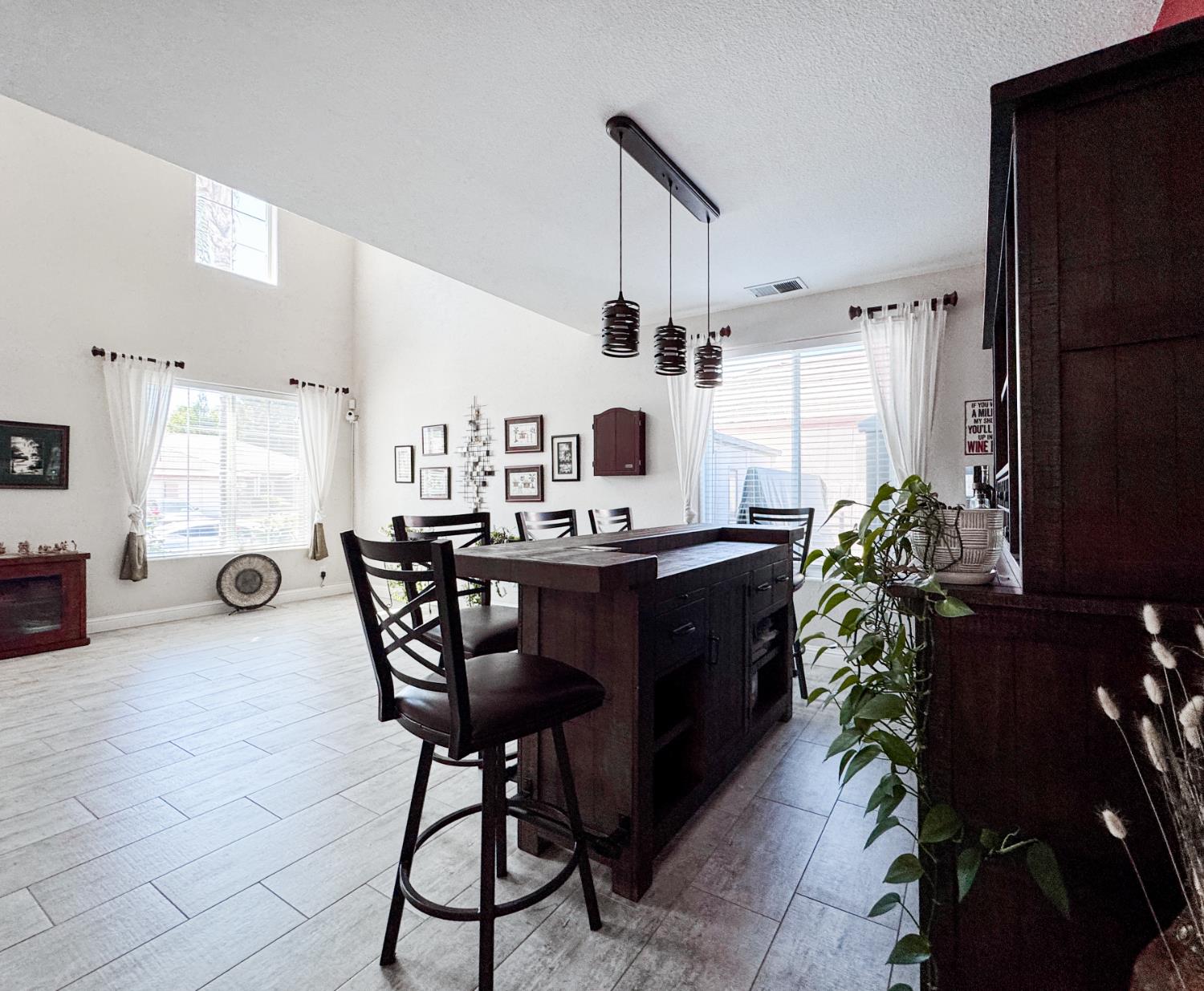 2457 Carson Avenue Clovis, CA 93611 - Photo 5 of 33 a view of a dining room with furniture