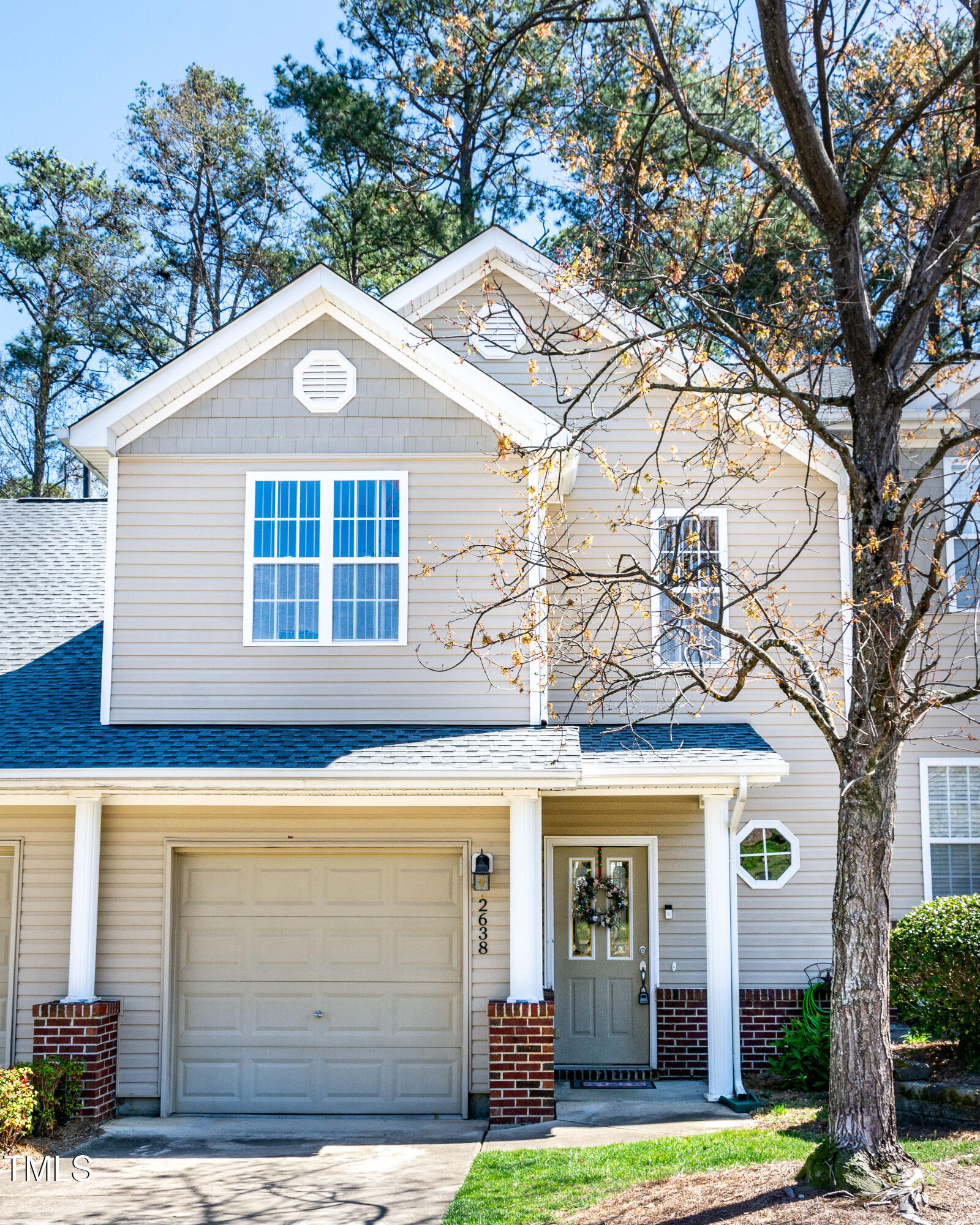 2638 Andover Glen Road Raleigh, NC 27604 - Photo 1 of 49 a front view of a house with garden