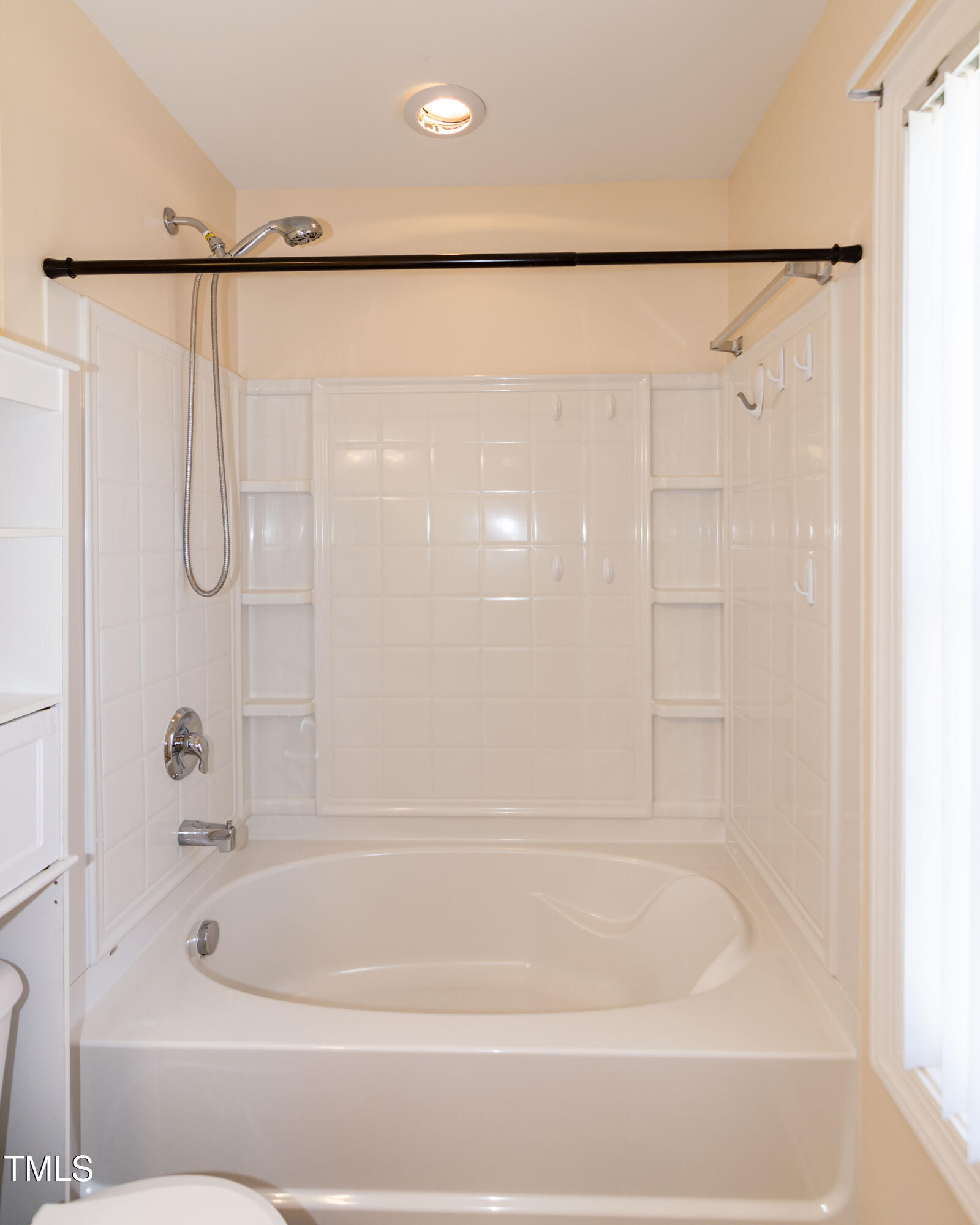 2638 Andover Glen Road Raleigh, NC 27604 - Photo 32 of 49 a bathroom with a shower and a bath tub