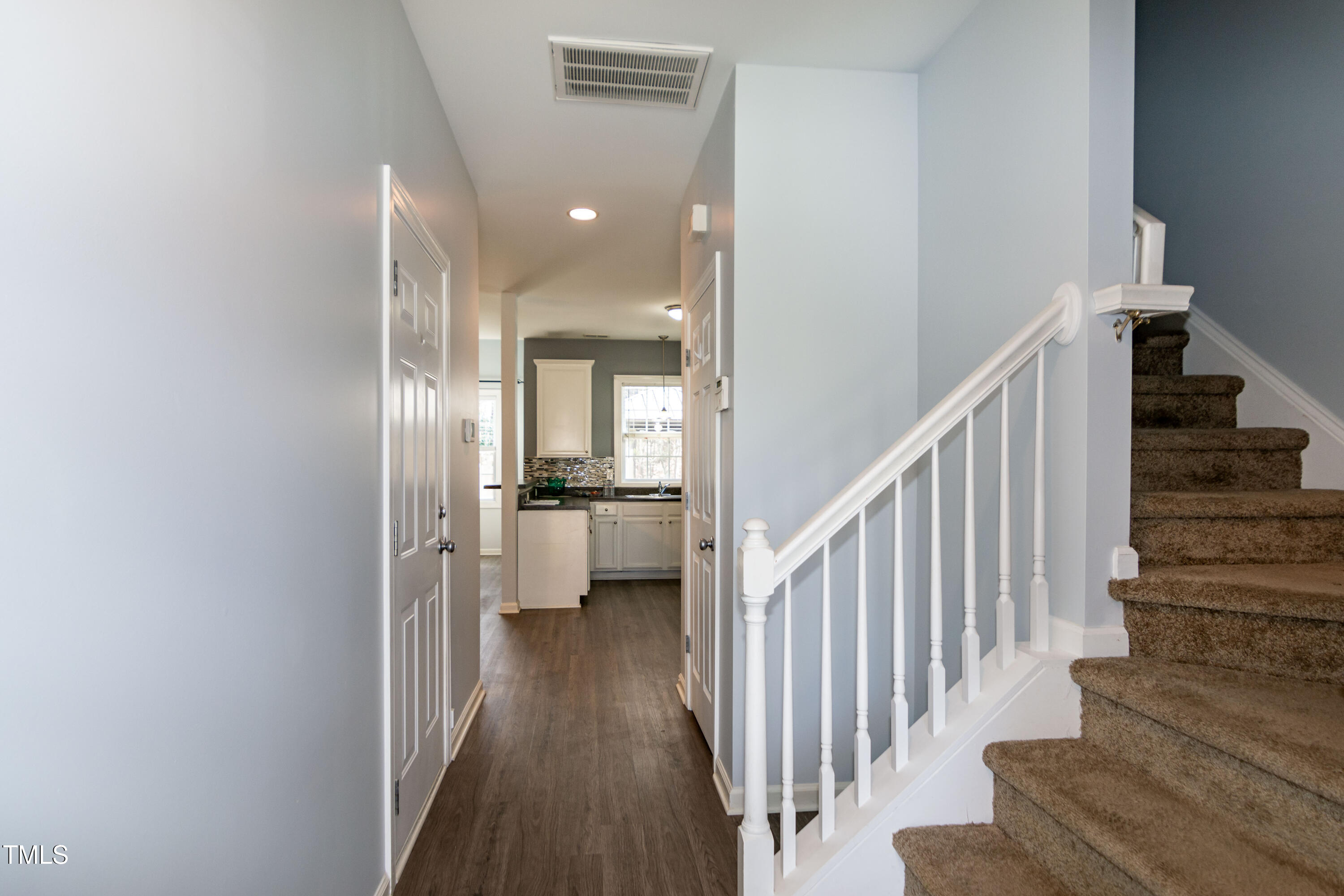 2638 Andover Glen Road Raleigh, NC 27604 - Photo 7 of 49 a view of entryway and hall with wooden floor
