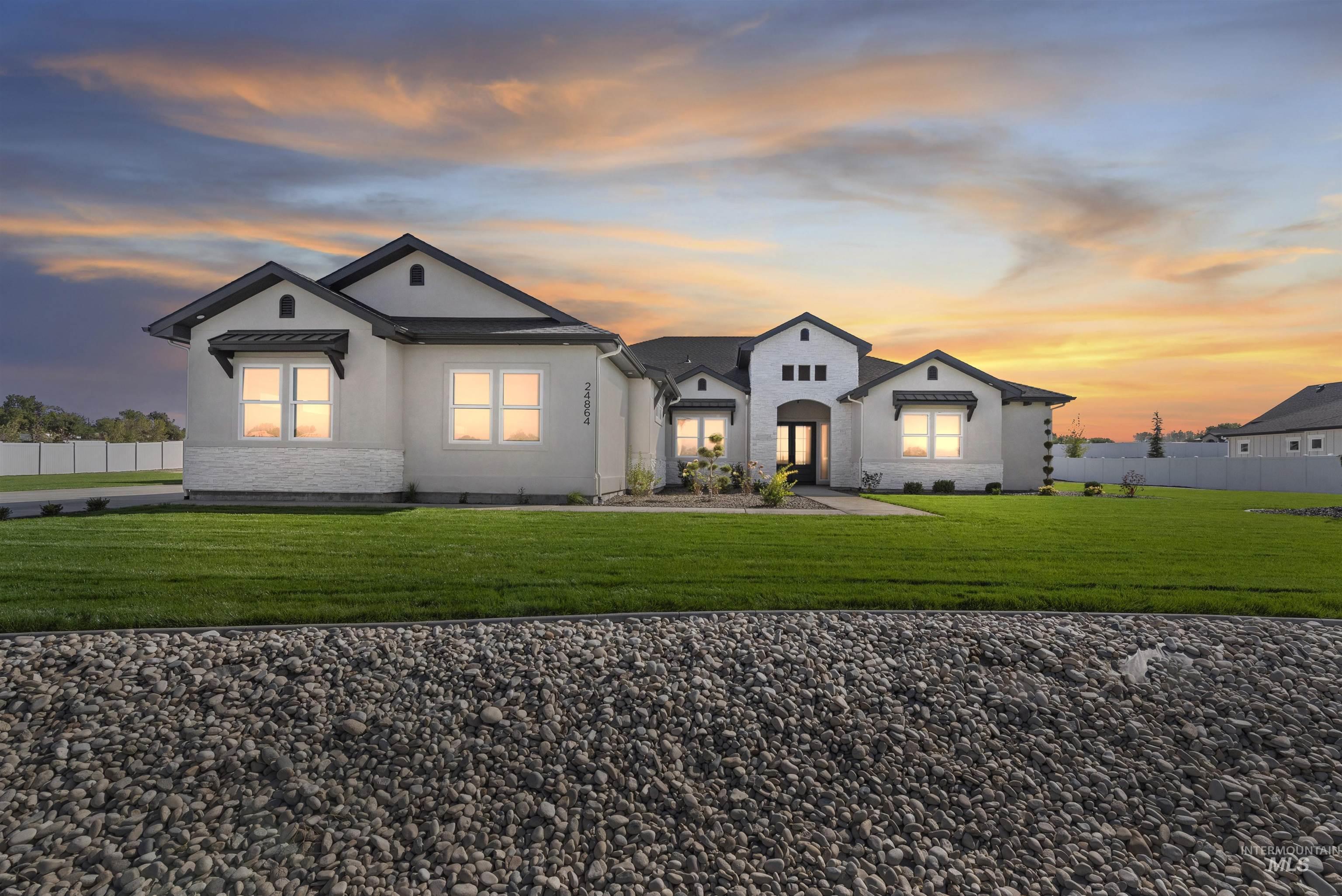 24864 Ardmore Court Caldwell, ID 83607 - Photo 3 of 48 View of front of property with stucco siding