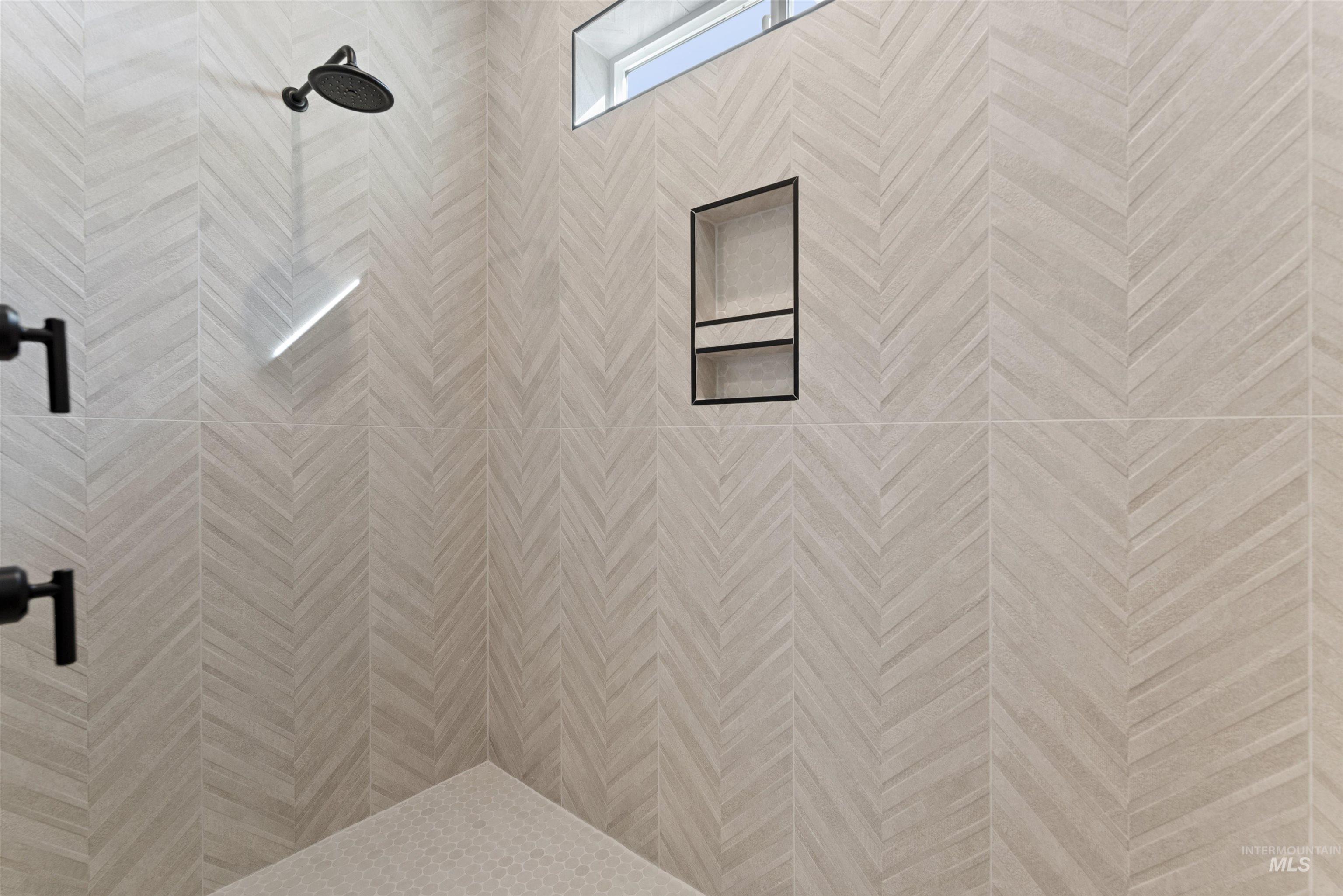 24864 Ardmore Court Caldwell, ID 83607 - Photo 34 of 48 Bathroom view of a tile shower