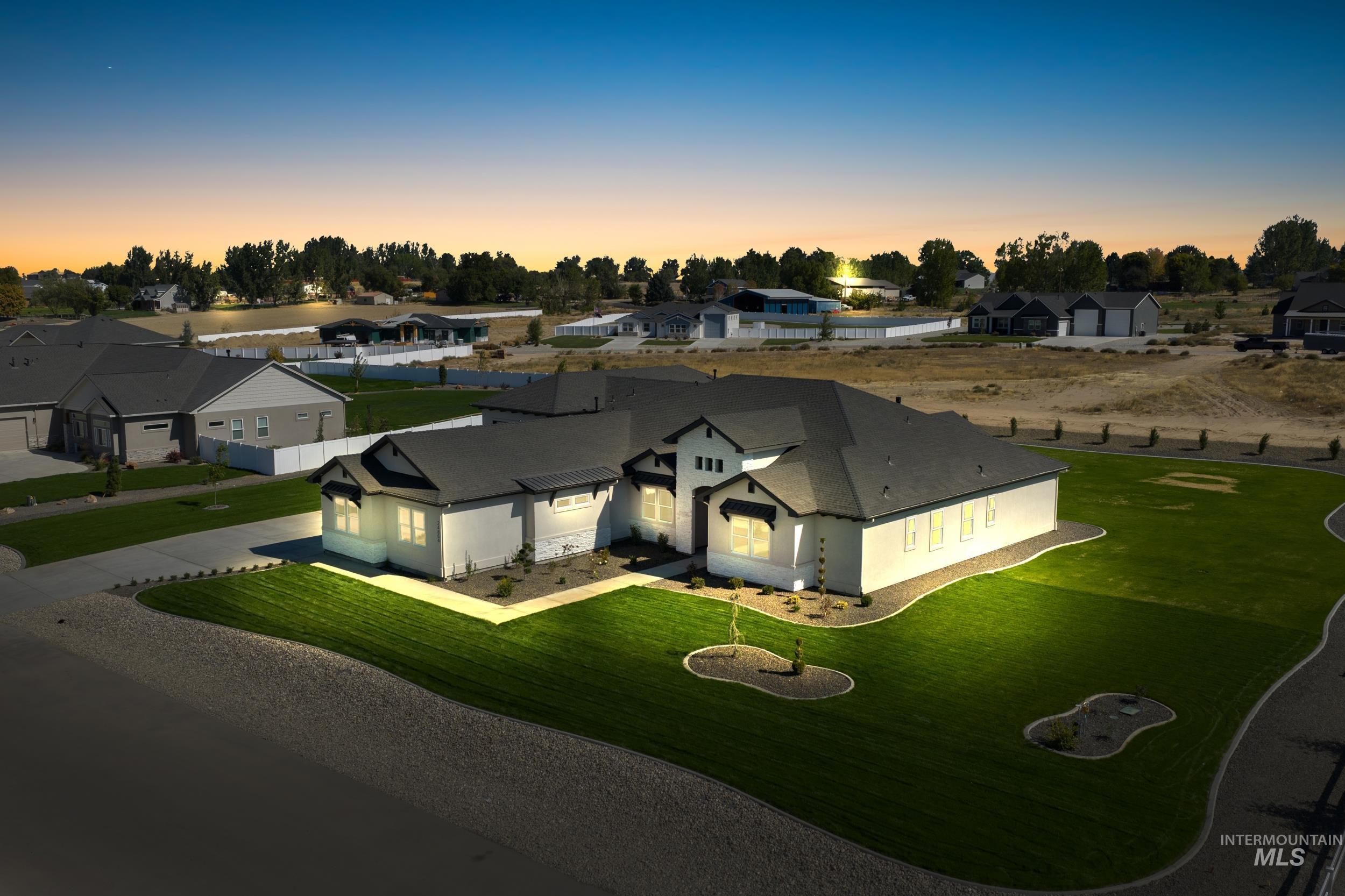 24864 Ardmore Court Caldwell, ID 83607 - Photo 4 of 48 Aerial view at dusk of a residential view