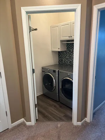 a kitchen with stainless steel appliances granite countertop a refrigerator stove and sink