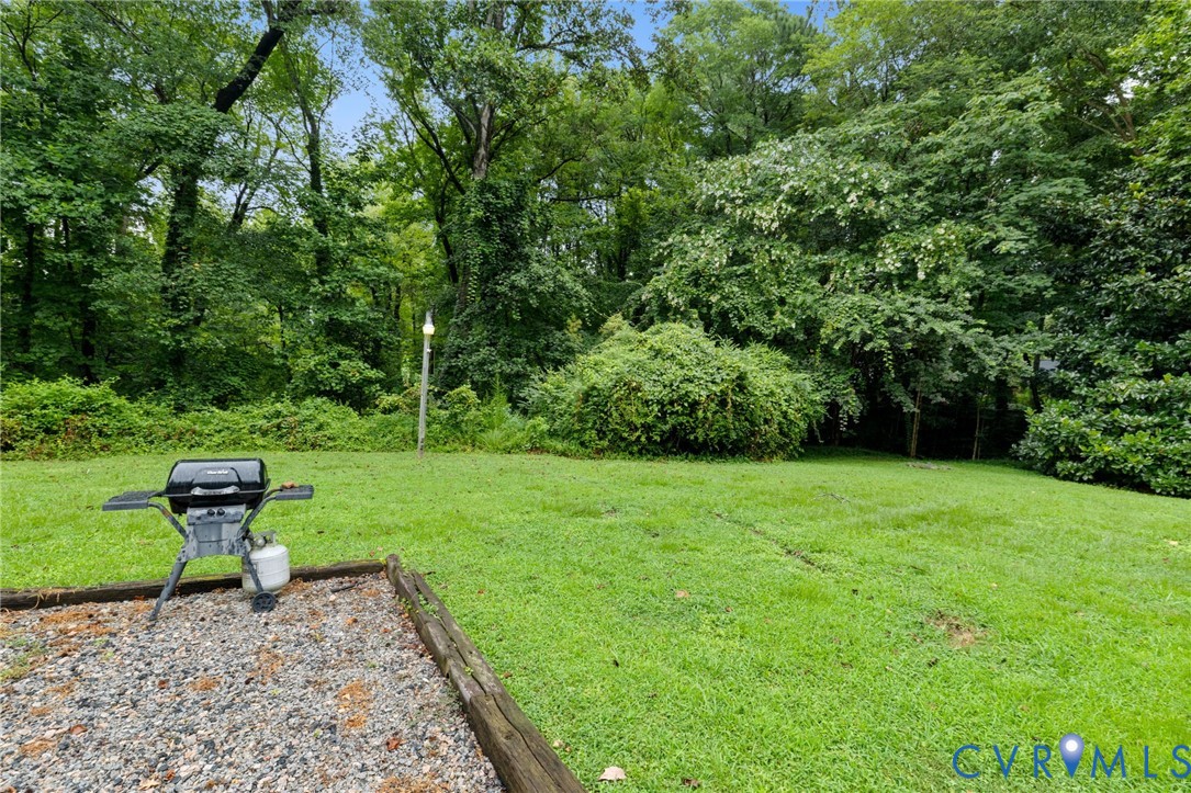 10500 Cherylann Road North Chesterfield, VA 23236 - Photo 20 of 23 Side yard is very quiet and wooded, creek runs to
