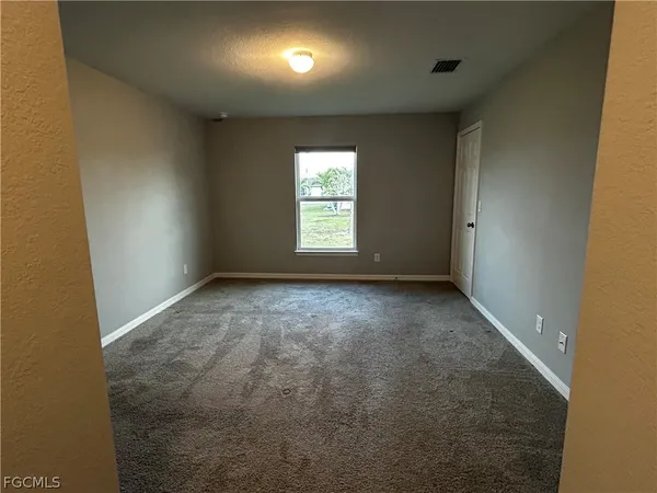 an empty room with a window