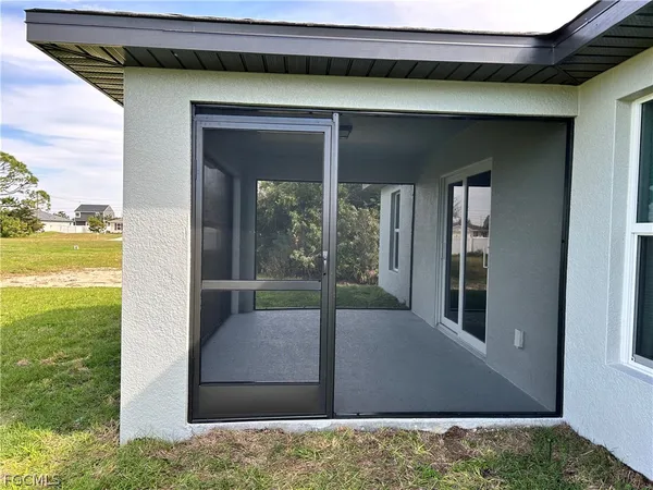 a view of a backyard of a house