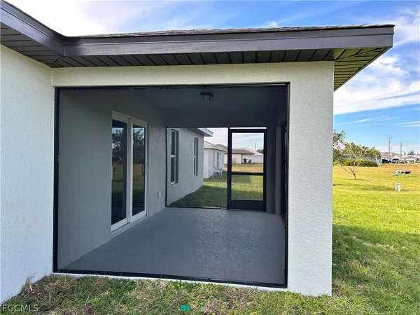 a view of a room that has a large window