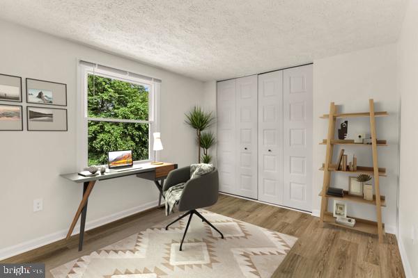 10640 Gorman Road Laurel, MD 20723 - Photo 12 of 25 a workspace with wooden floor and a window