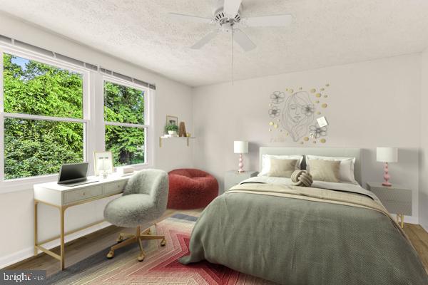 10640 Gorman Road Laurel, MD 20723 - Photo 14 of 25 a bedroom with a bed and a large window