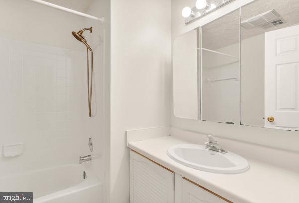 10640 Gorman Road Laurel, MD 20723 - Photo 16 of 25 a bathroom with a sink and a mirror