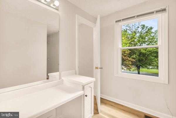 10640 Gorman Road Laurel, MD 20723 - Photo 18 of 25 a bathroom with a sink and a window