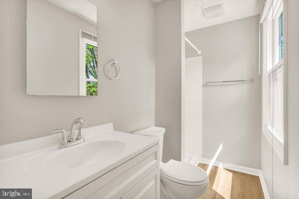 10640 Gorman Road Laurel, MD 20723 - Photo 19 of 25 a white toilet sitting next to a bathroom sink