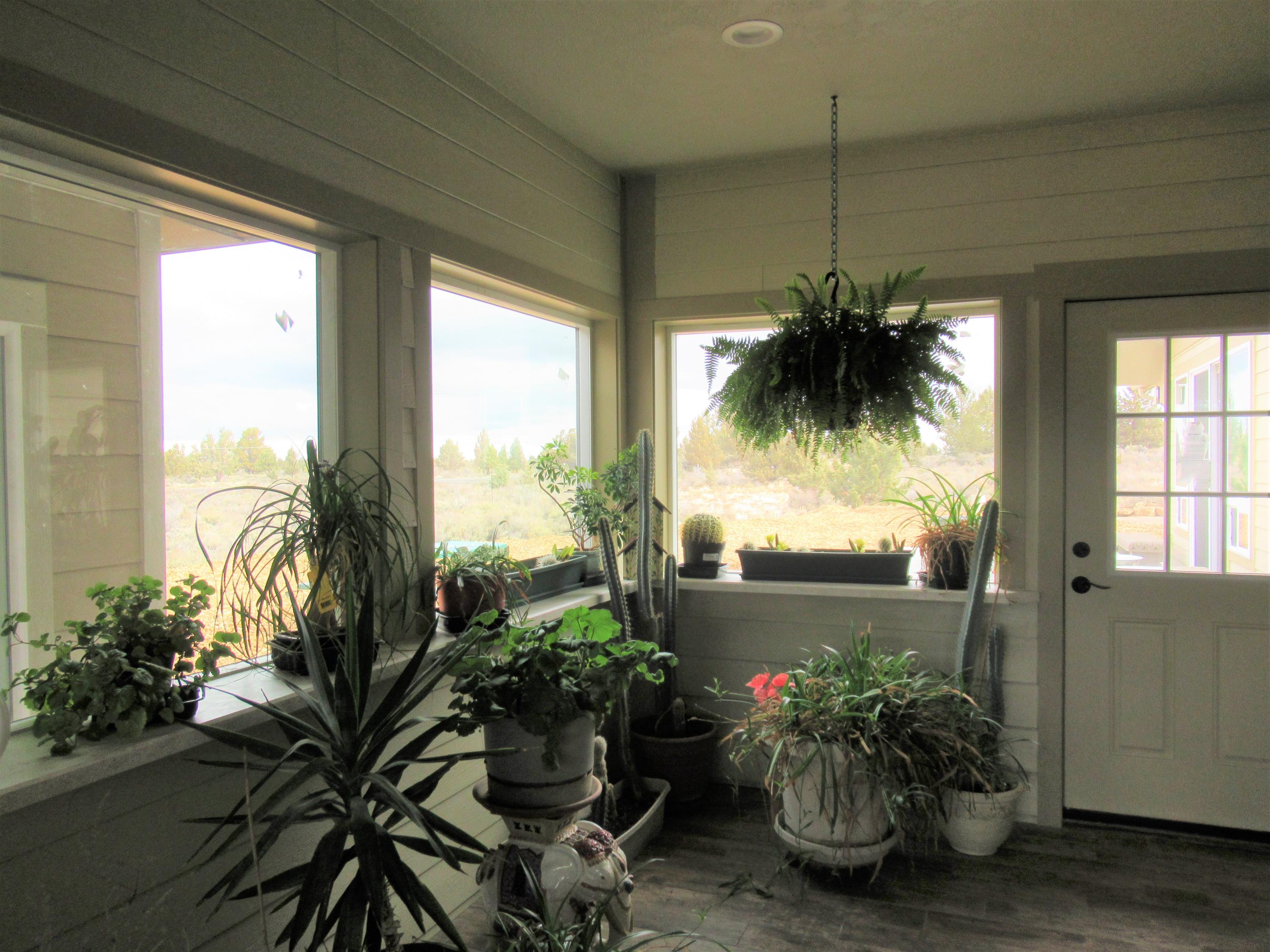22063 Rickard Road Bend, OR 97702 - Photo 25 of 29 Need an indoor patio? Greenhouse room is heated, has access doors to outside and to master and master bath.
