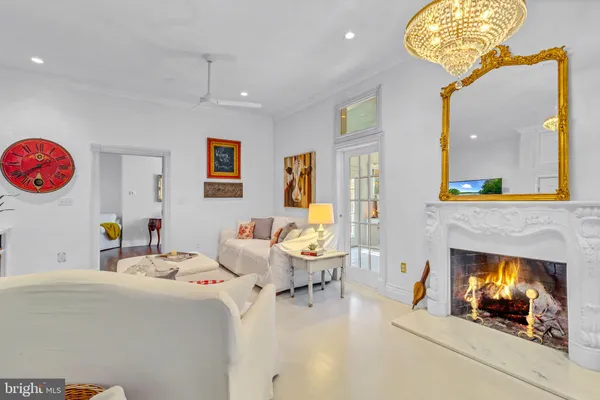 a bedroom with a bed and a large mirror