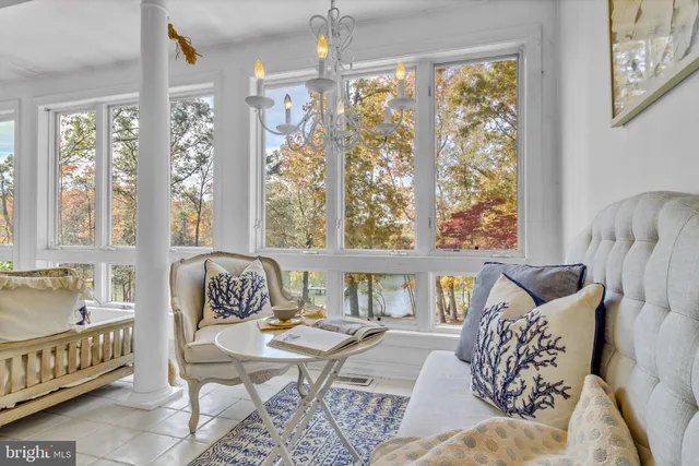 a spacious bedroom with a bed and a couch