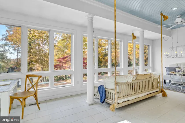 a kitchen with granite countertop appliances sink and cabinets
