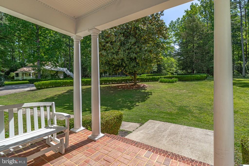 673 Nugent Road Weems, VA 22576 - Photo 70 of 72 a view of a patio with a yard
