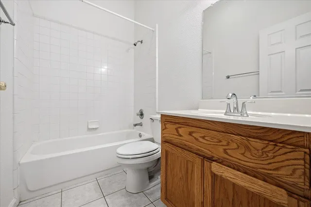 a bathroom with a sink a toilet and a bathtub