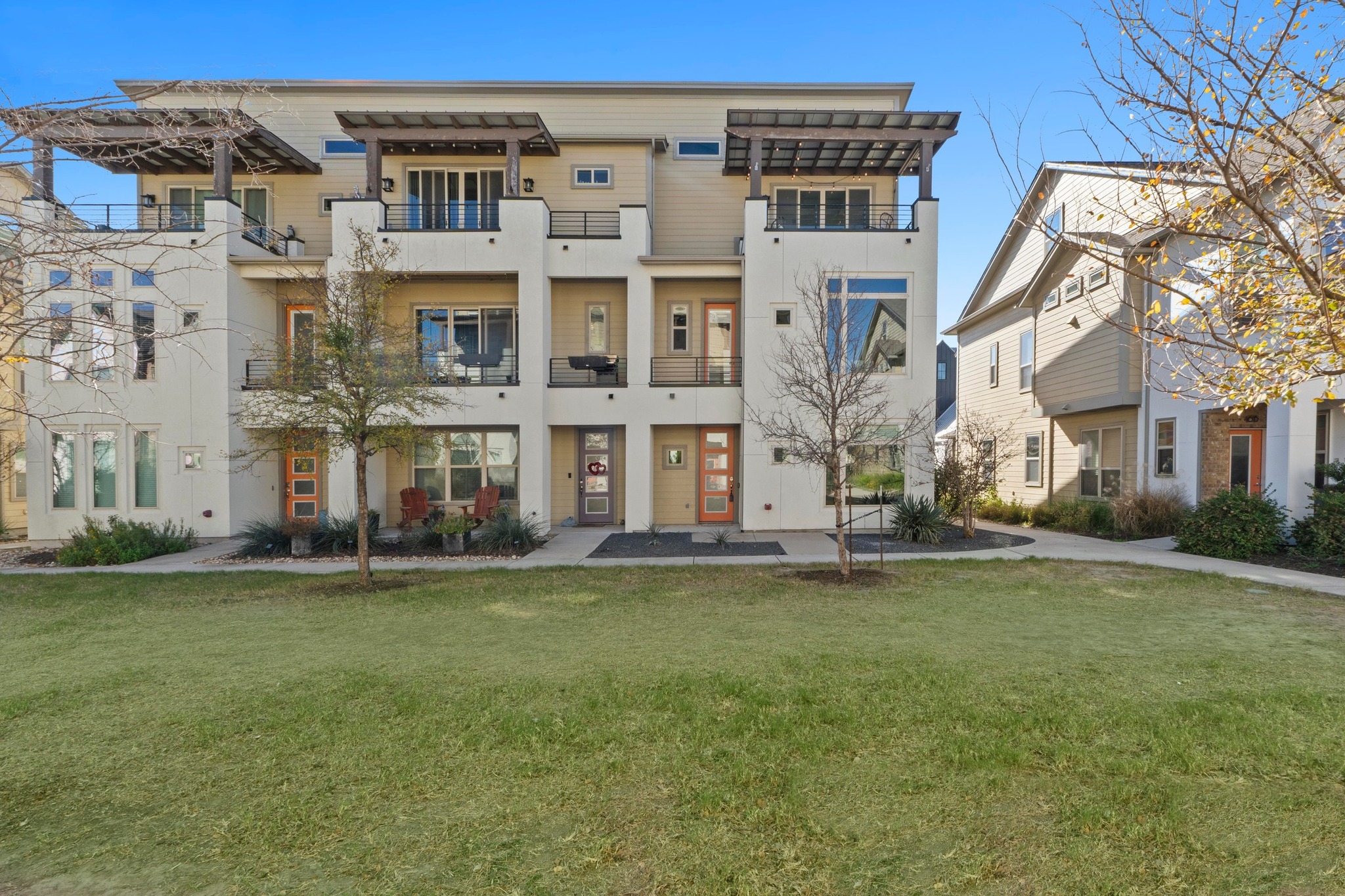 4617 Herzog Street Austin, TX 78723 - Photo 7 of 38 a view of a building with a yard