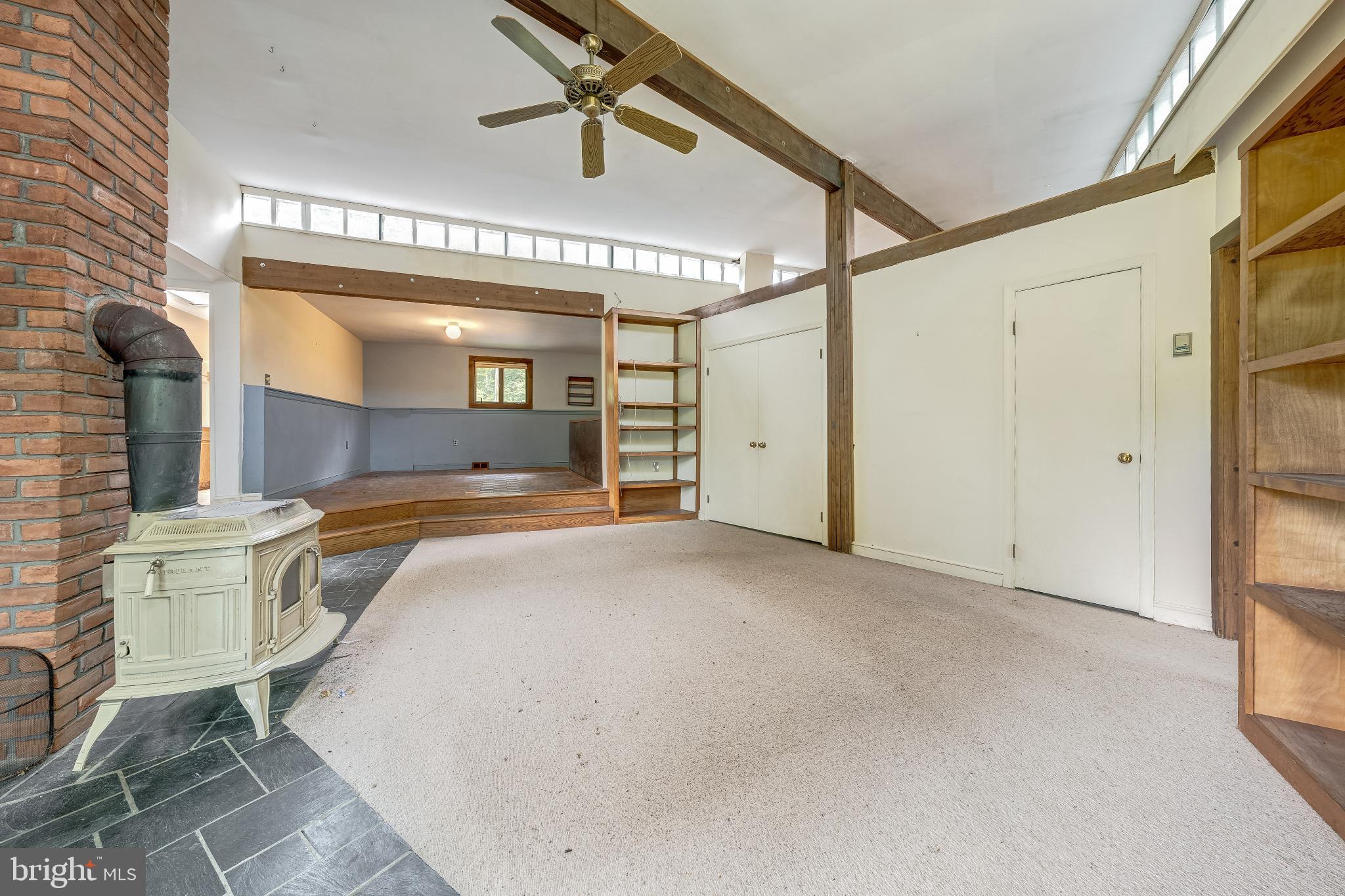 3908 Forrest School Road Smithsburg, MD 21783 - Photo 6 of 24 Spacious living area with rustic charm.