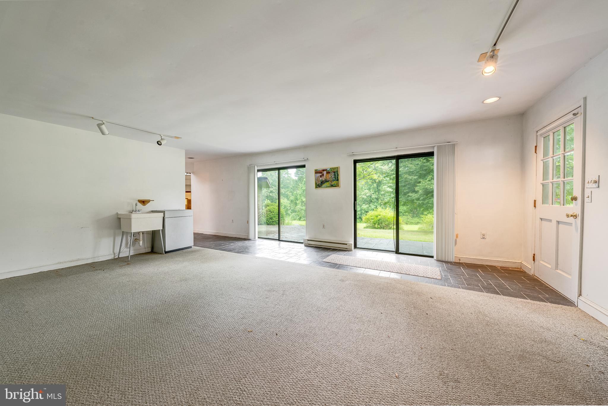 3908 Forrest School Road Smithsburg, MD 21783 - Photo 10 of 24 Spacious room with serene garden views.