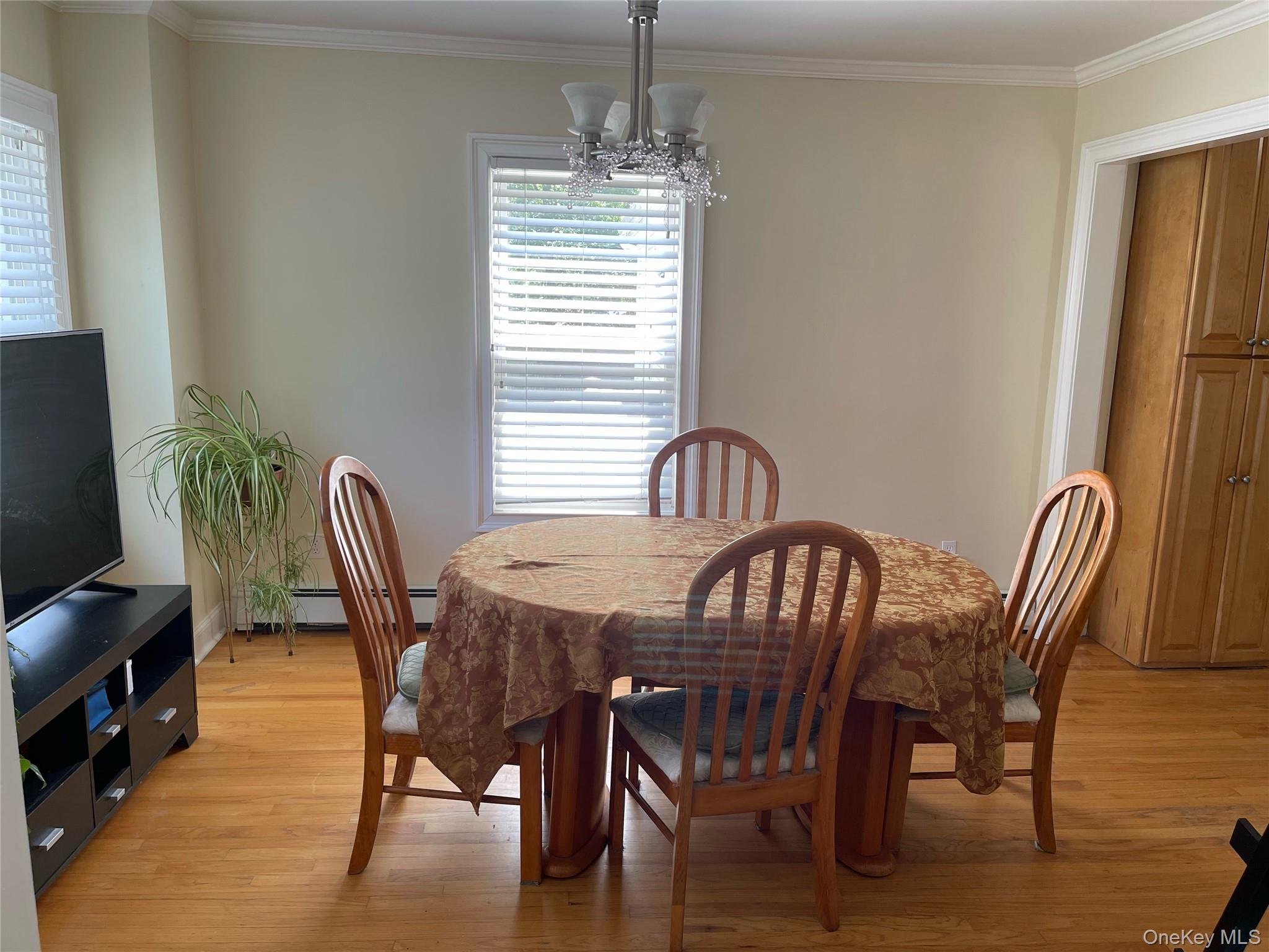 73 South Bedford Road Chappaqua, NY 10514 - Photo 12 of 30 a view of a dining room with furniture window and wooden floor