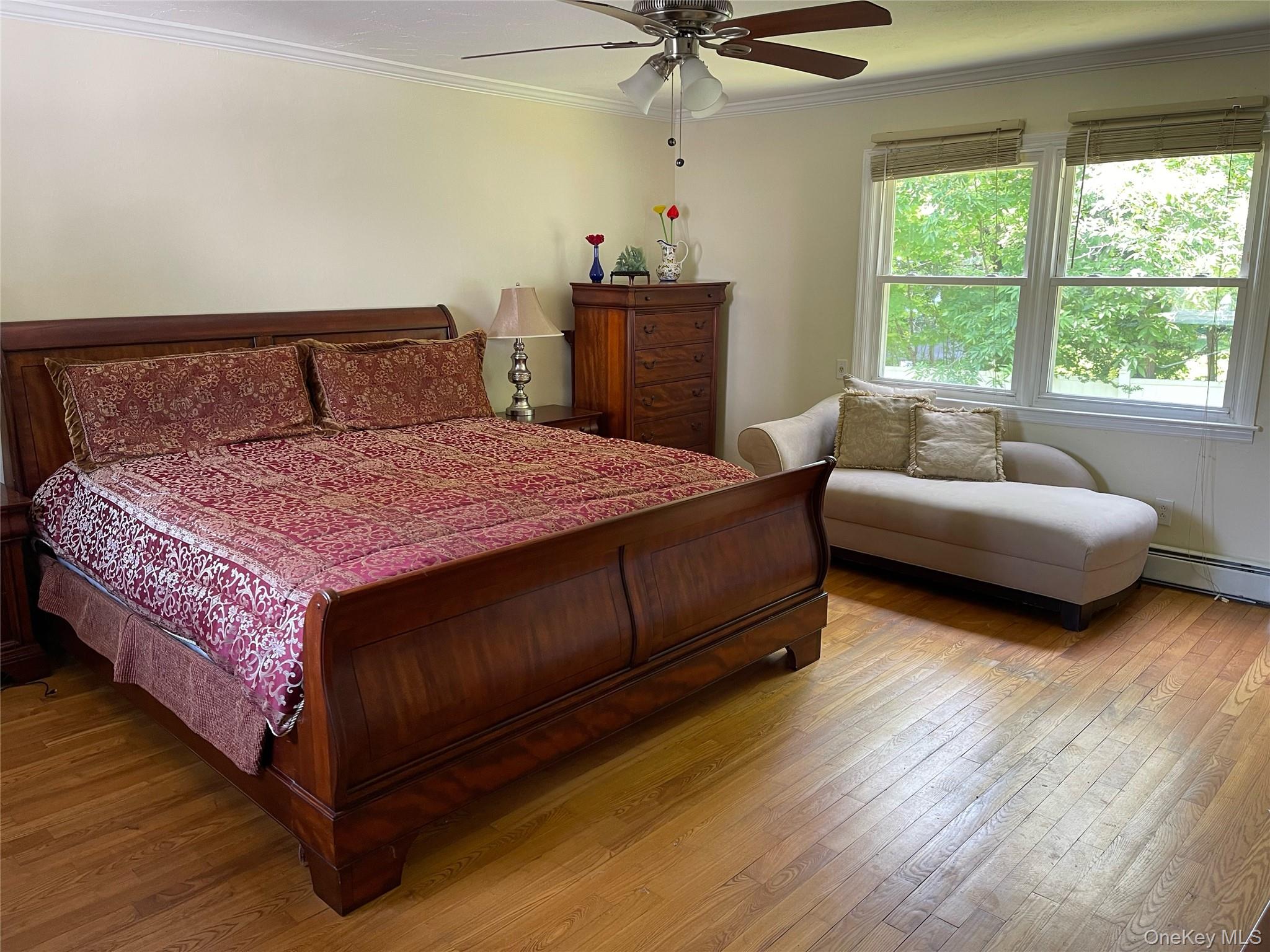 73 South Bedford Road Chappaqua, NY 10514 - Photo 15 of 30 a bedroom with a bed and a couch