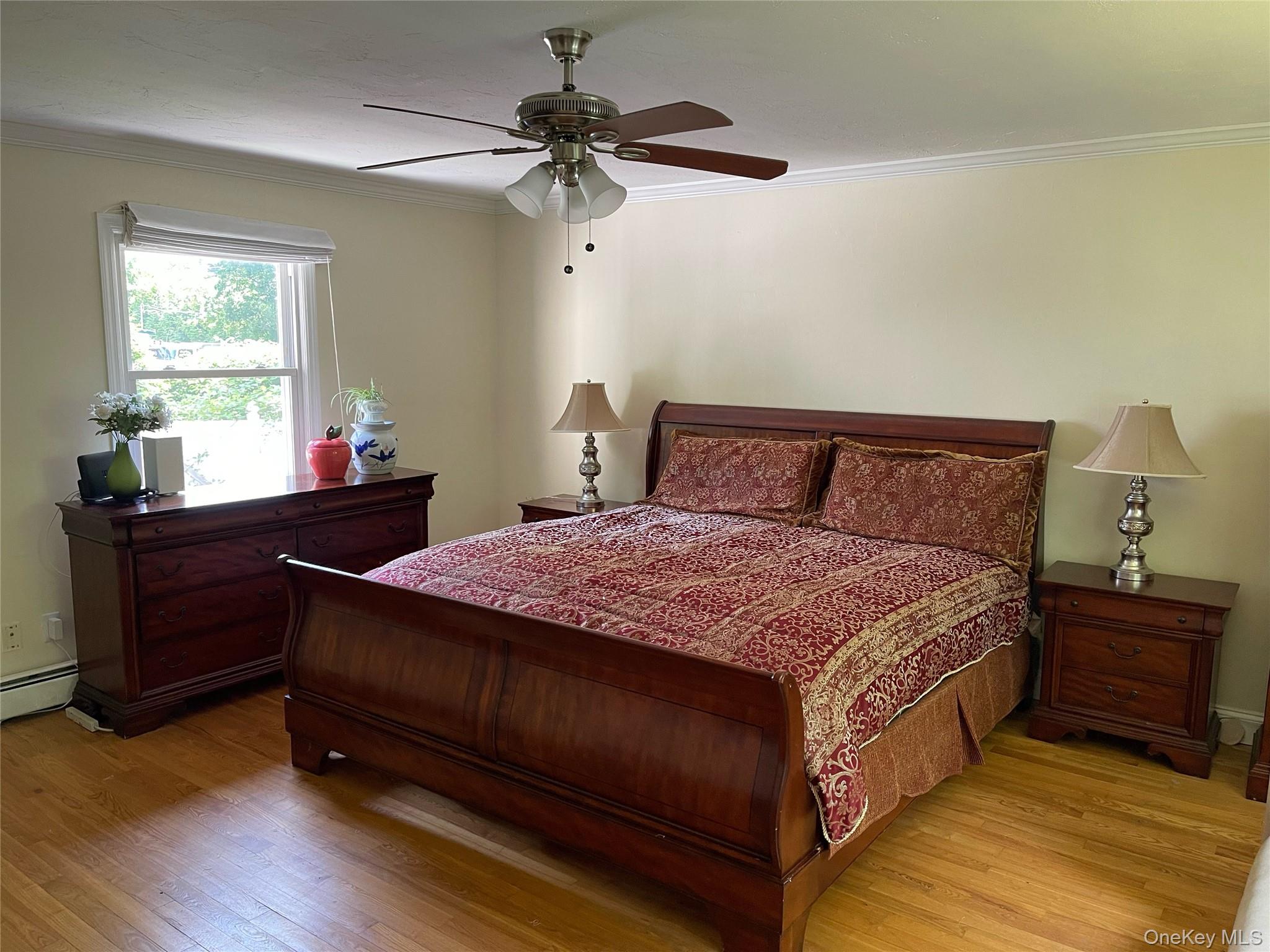 73 South Bedford Road Chappaqua, NY 10514 - Photo 16 of 30 a bedroom with a bed and a table