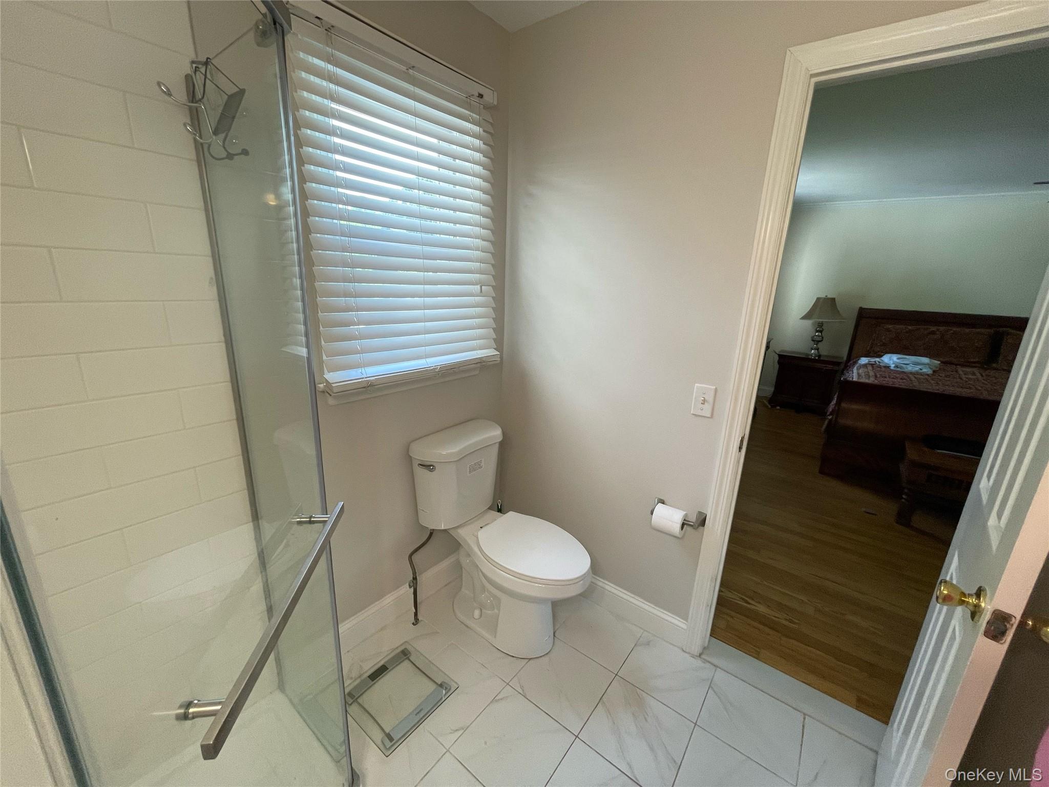 73 South Bedford Road Chappaqua, NY 10514 - Photo 21 of 30 a bathroom with a toilet and a shower