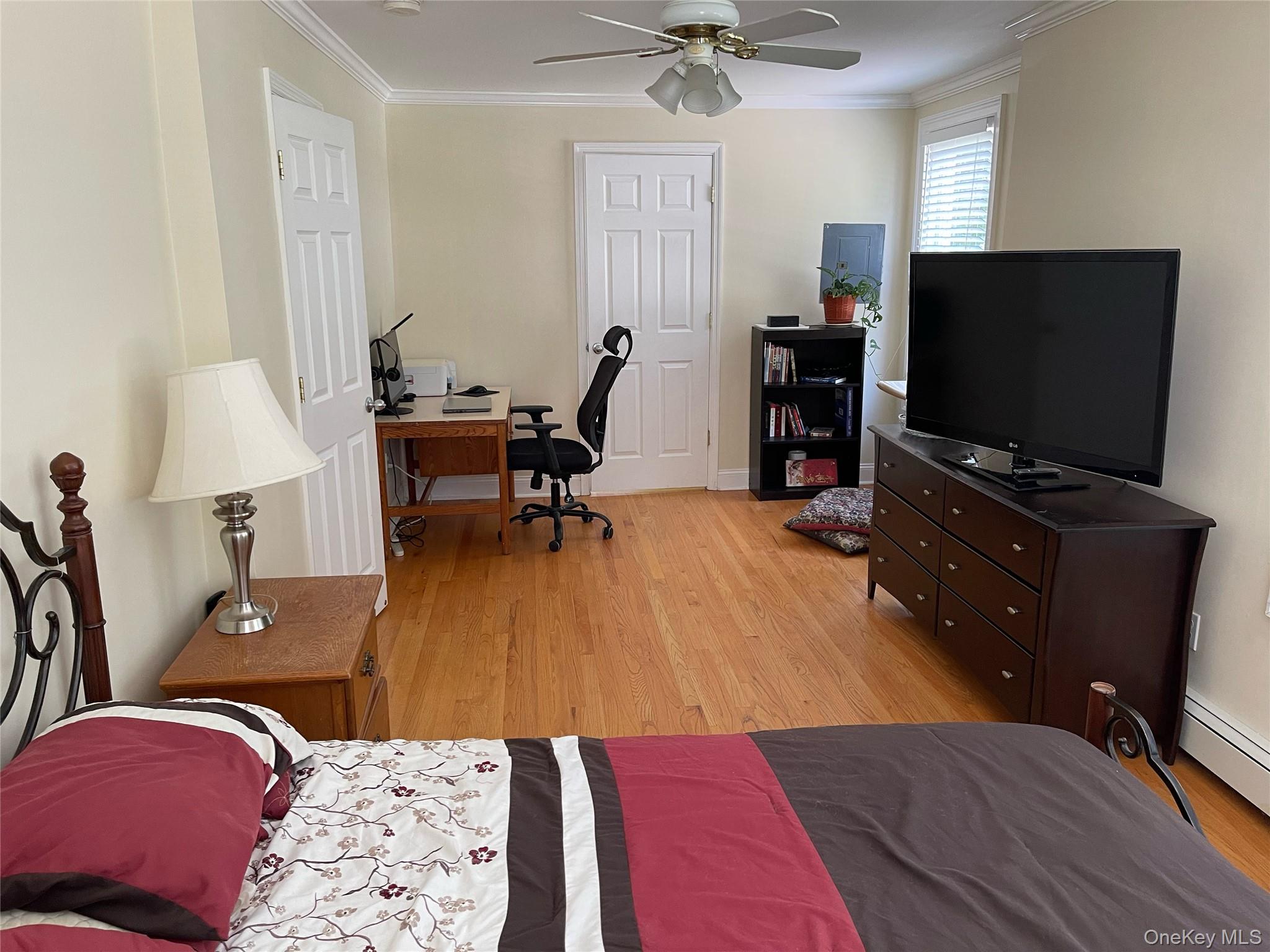 73 South Bedford Road Chappaqua, NY 10514 - Photo 24 of 30 a living room with furniture and a flat screen tv