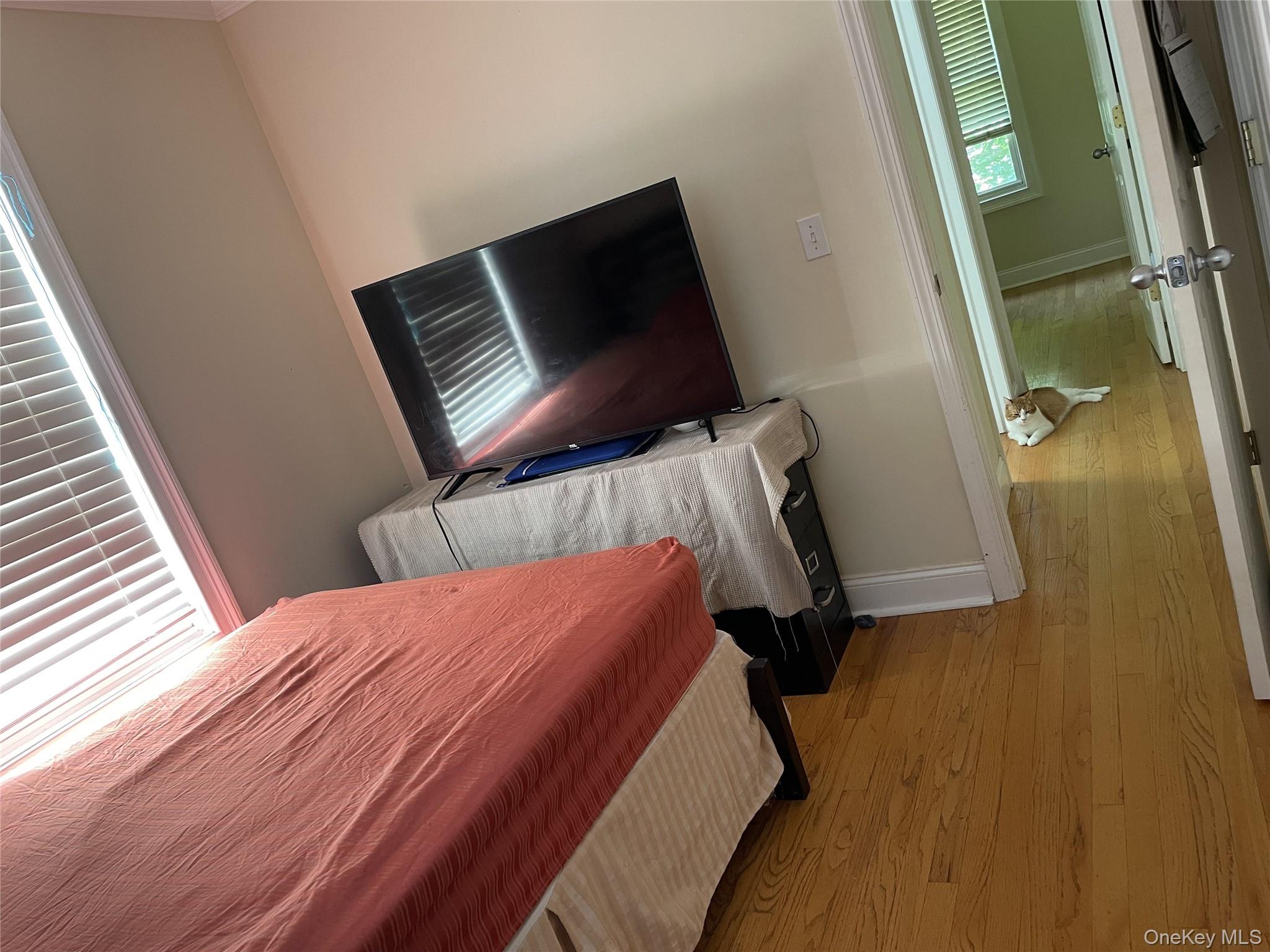 73 South Bedford Road Chappaqua, NY 10514 - Photo 26 of 30 a bedroom with a bed and a mirror