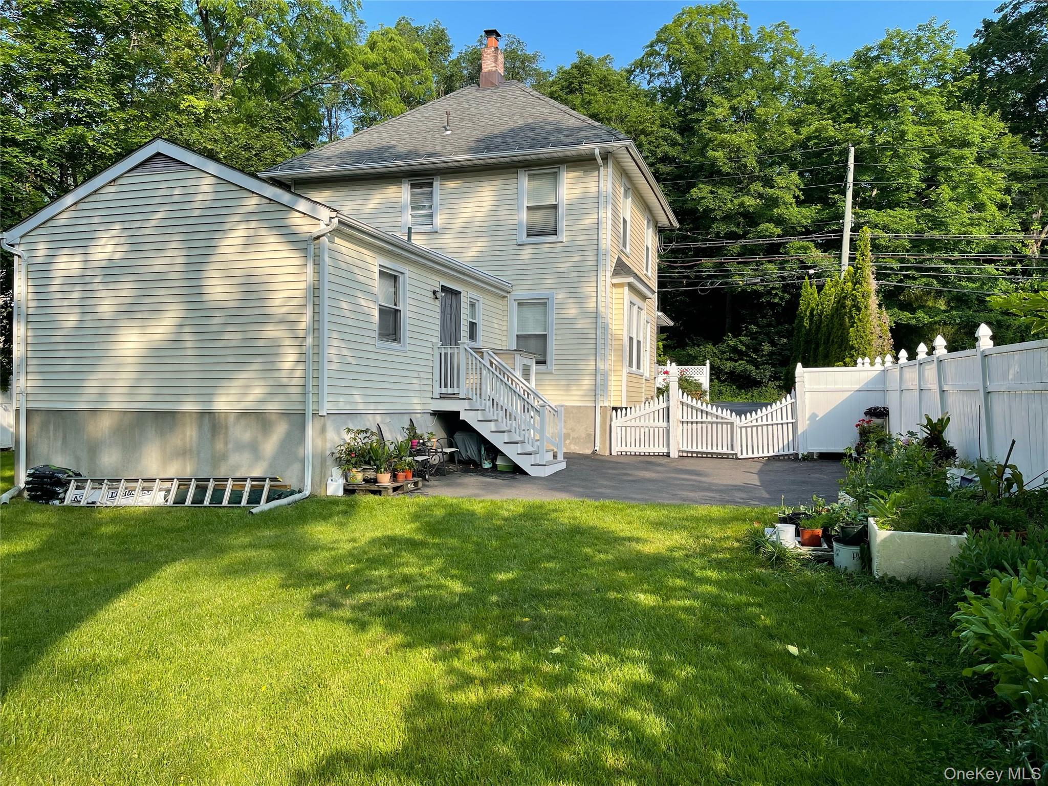 73 South Bedford Road Chappaqua, NY 10514 - Photo 5 of 30 a view of a house with a yard