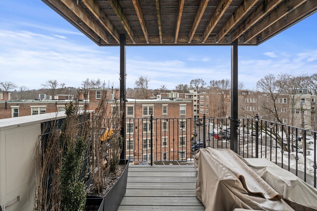 9 Regent Circle, Unit 3 Brookline, MA 02445 - Photo 11 of 20 a view of a balcony with city view