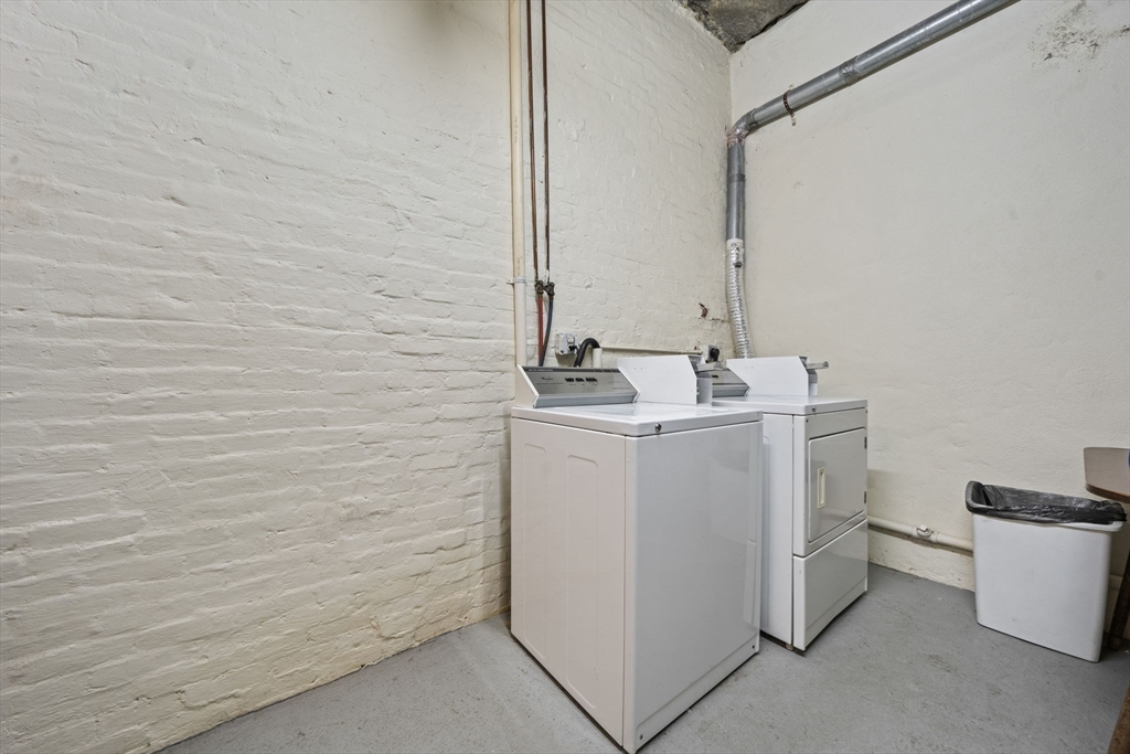 9 Regent Circle, Unit 3 Brookline, MA 02445 - Photo 13 of 20 a utility room with dryer and washer