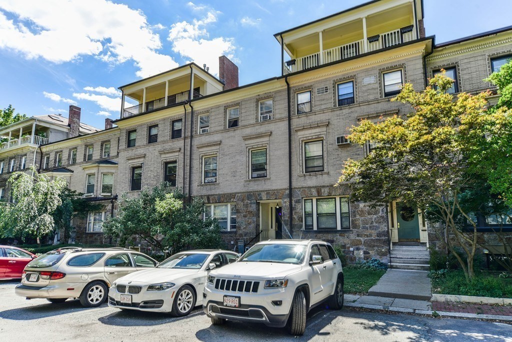 9 Regent Circle, Unit 3 Brookline, MA 02445 - Photo 15 of 20 a couple of cars parked in front of a building